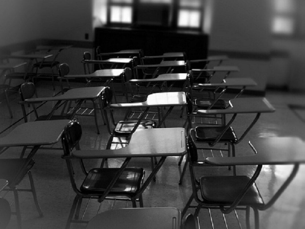 solitary-desks-no-students-empty-classroom-dark-caracas-venezuela-solitary-desks-no-students-empty-191463678